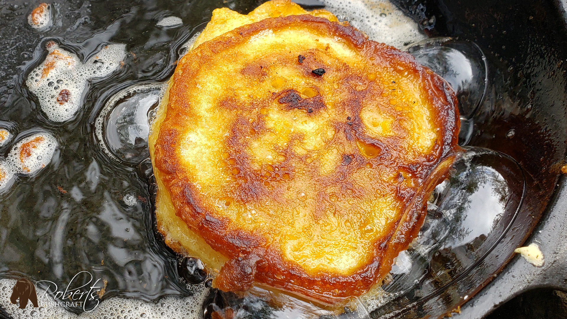 frying corn fritters in crisco at camp